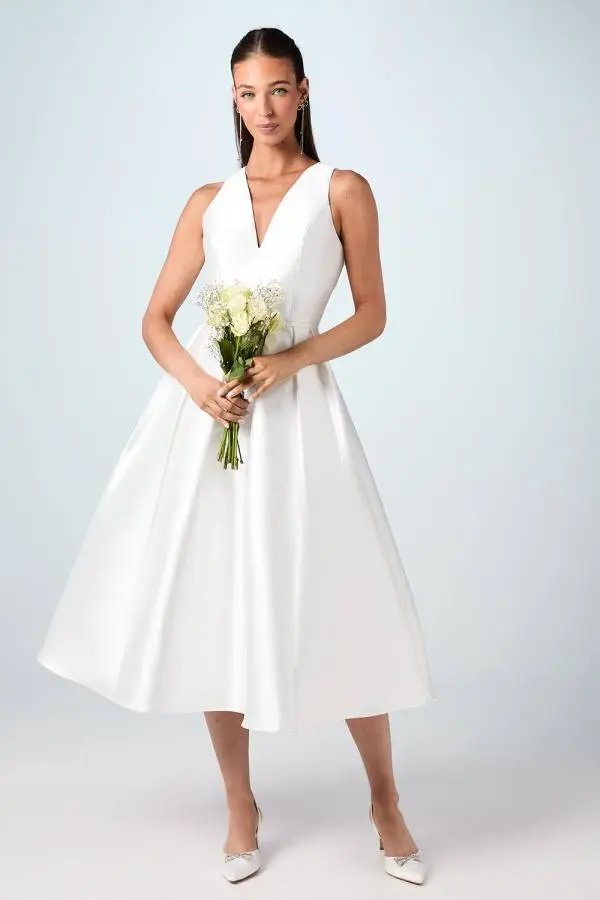 Coast Women's Plunge Neck Bow Waist Midi Wedding Dress With Pockets in Ivory 