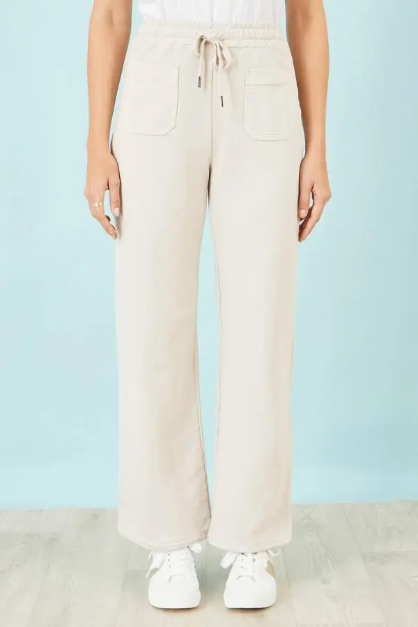 Yumi Women's Cream Relaxed Stretch Wide Leg Trousers With Pockets in Beige 