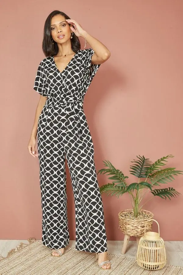 Yumi Women's Black Geometric Print Wrap Jumpsuit 