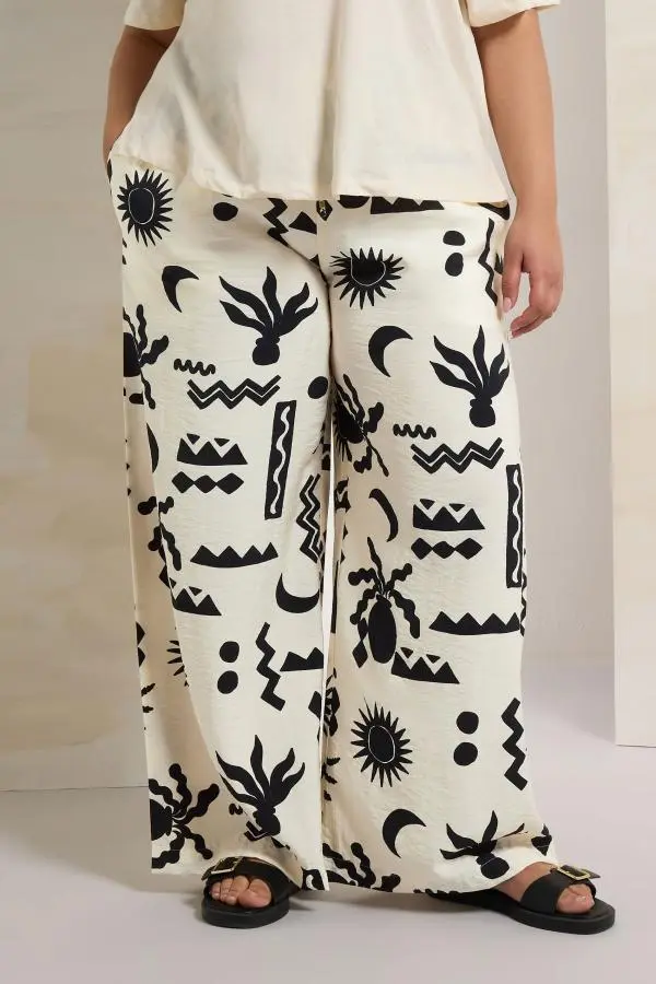 Yours Plus Size Cream Abstract Print Twill Wide Leg Trousers Size 34-36