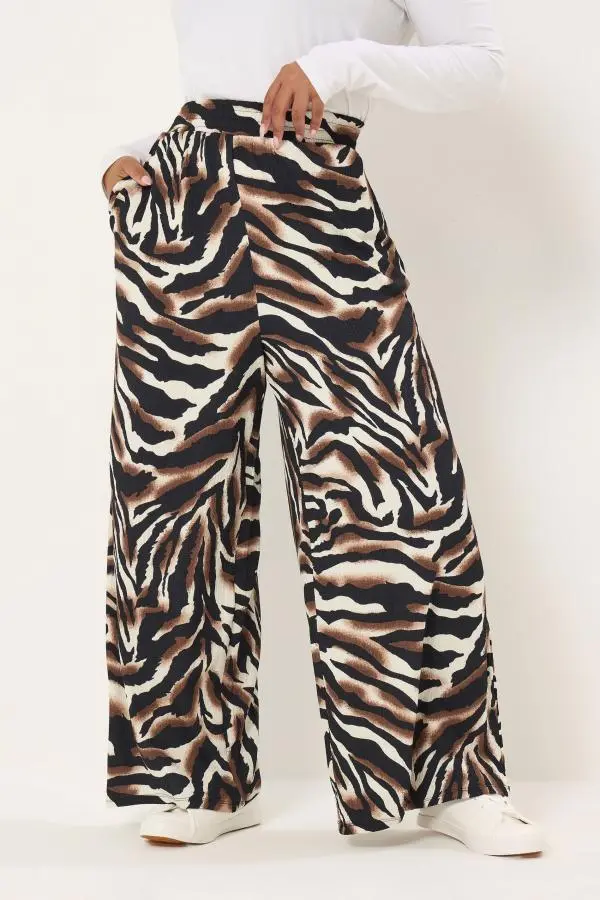 Yours Plus Size Black Animal Print Trousers Size 30-32