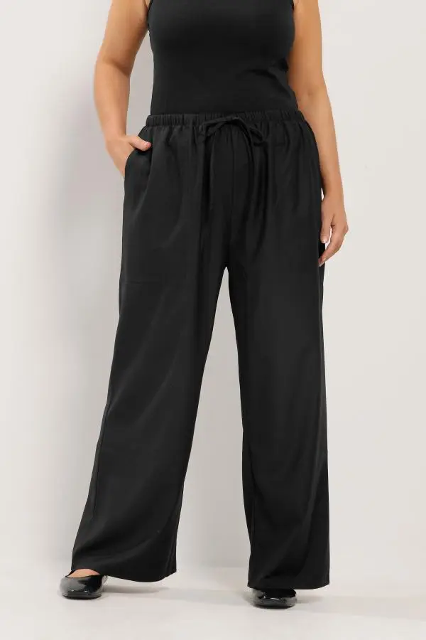 Yours Plus Size Black Slim Waist Wide Leg Trousers Size Short > 30-32