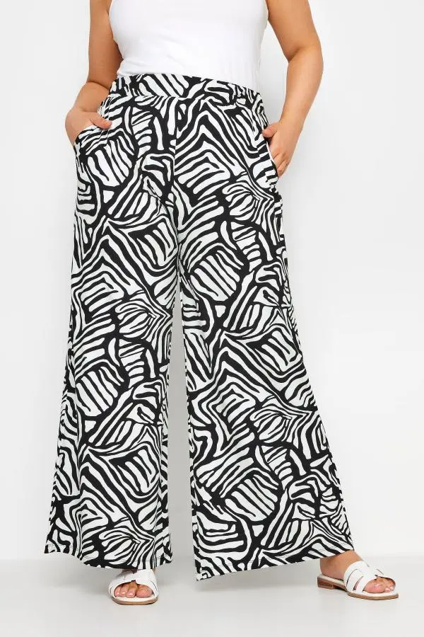 Yours Plus Size Black Abstract Print Wide Leg Trousers Size Regular > 28