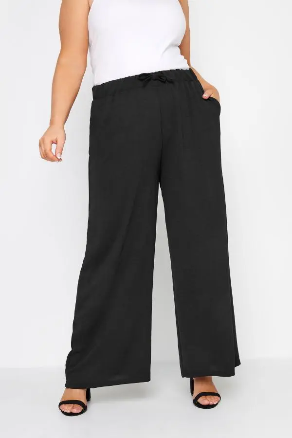 Yours Plus Size Black Stretch Jersey Wide Leg Trousers Size 30-32